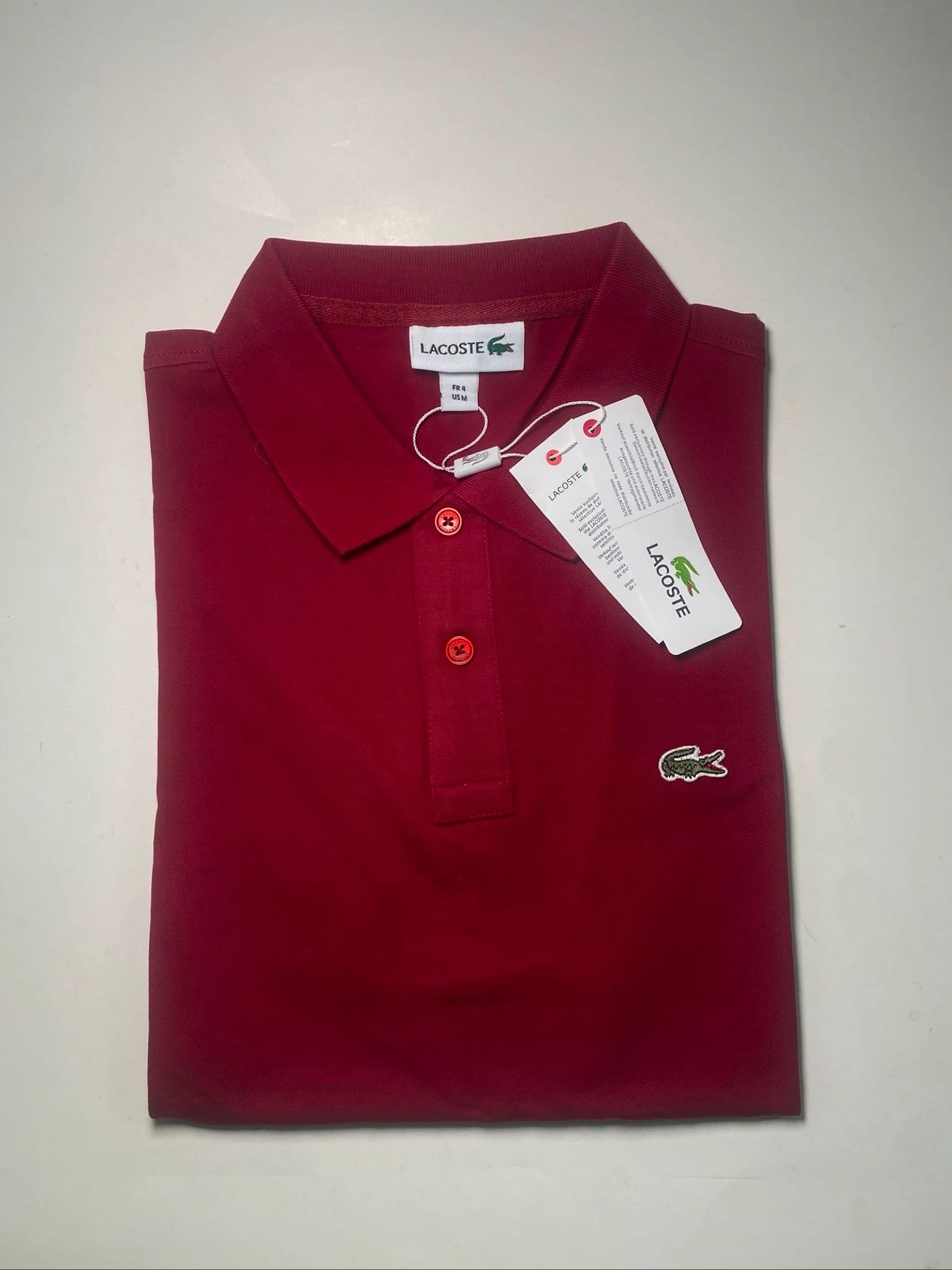 Polo Lacoste neuf avec etiquette